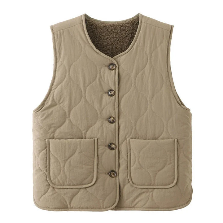 Fall fashion women's reversible quilted vest, Charm Collection, a warm winter layering piece.
