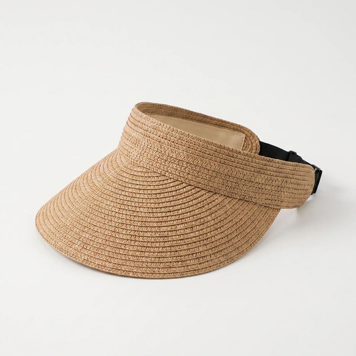 Adjustable beige women's roll-up visor hat, easy to pack for travel, great sun protection for summer.