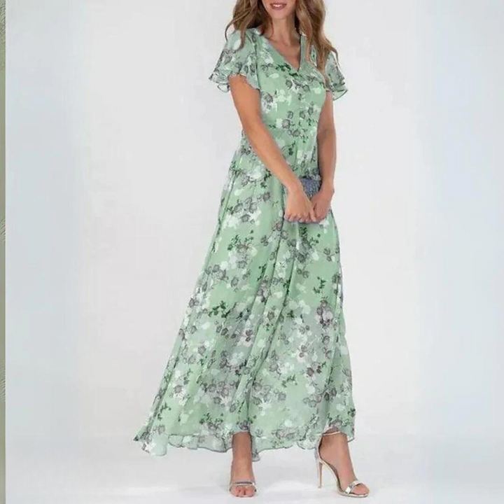 Stunning women's floral maxi dress with flutter sleeves. V-neck design, perfect for special occasions & spring events.