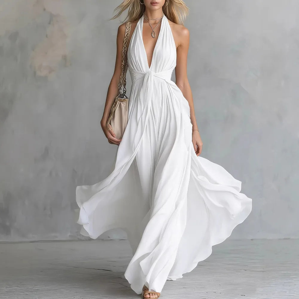 Elegant women's formal evening dress. Flowy pleated backless maxi with halter neck, ideal for special occasions.