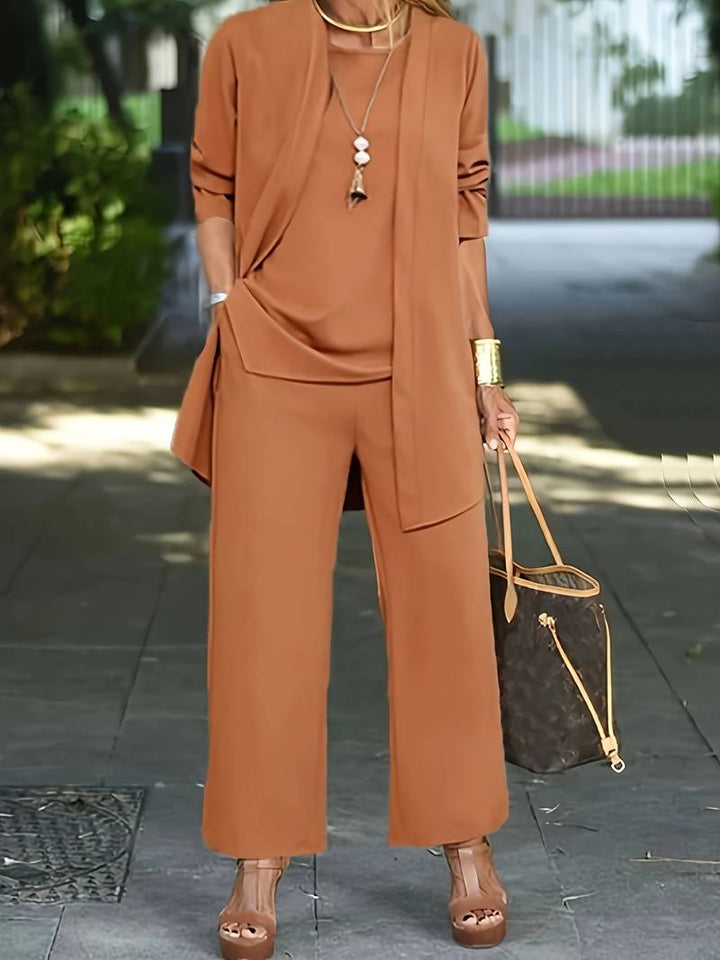 Comfortable women's loungewear set: long sleeve top, wide leg pants, & matching 3 piece design.
