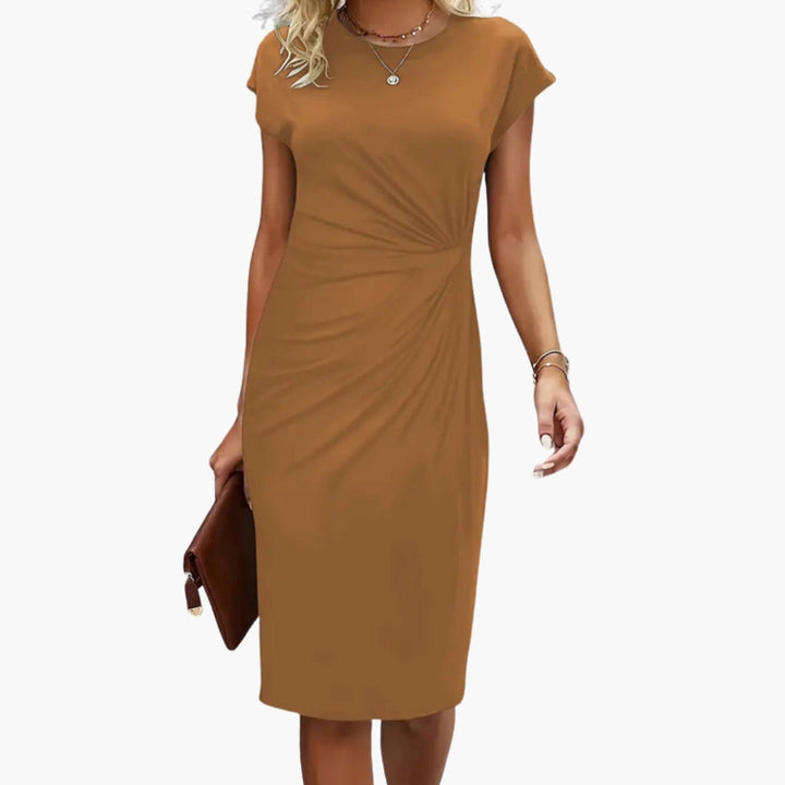 Elegant women's midi dress, short sleeve, round neck, offering a timeless style for any casual or work occasion.