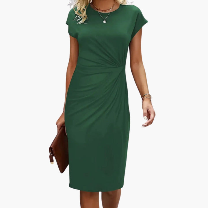 Stylish women's round neck midi dress with short sleeves, a versatile staple for spring workwear or elegant events.
