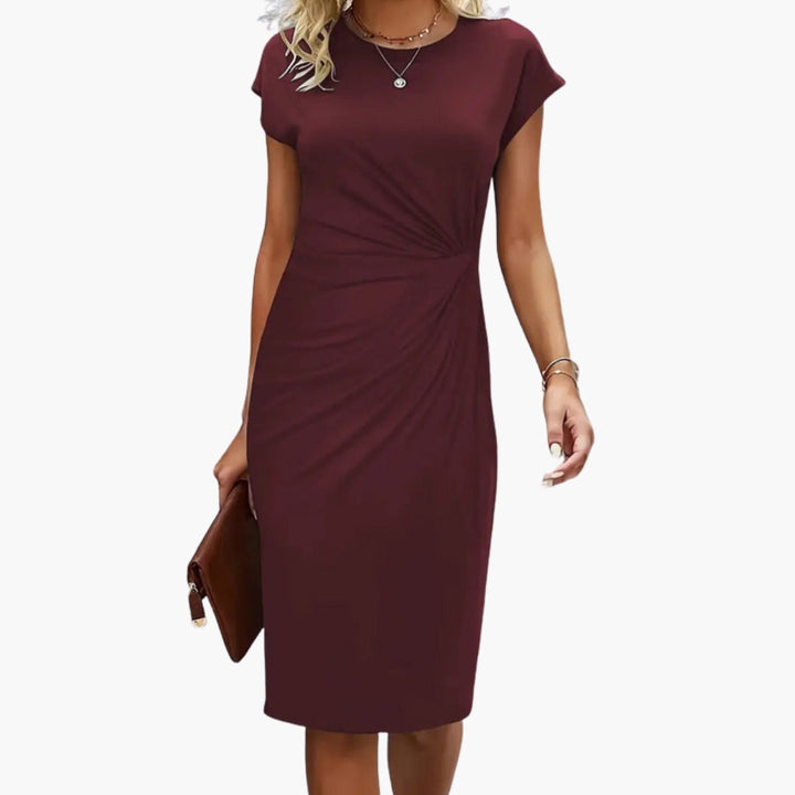 Elegant women's round neck short sleeve midi dress, a sophisticated choice for versatile casual wear or work environments.