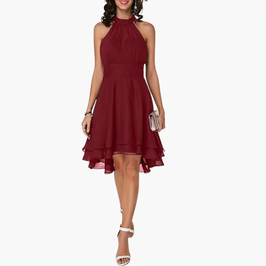 Chic women's round neck sleeveless dress, featuring elegant ruffle detailing and a comfortable knee-length cut. Summer ready.