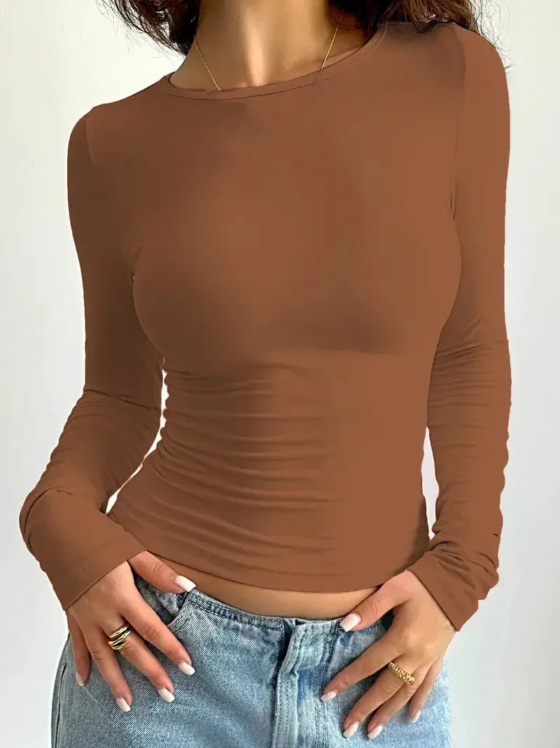 Everyday women's top: slim fit, long sleeve, crew neck, & chic ruched details. Great for layering.