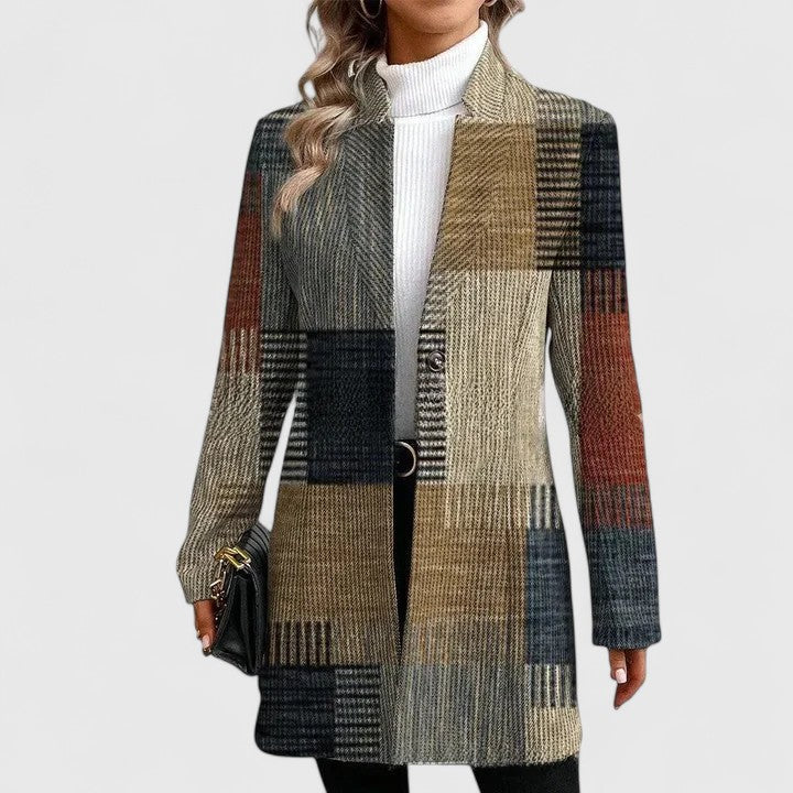 Stylish women's longline plaid blazer. Rustic earthy tones for autumn/winter layering, perfect for smart casual outfits.