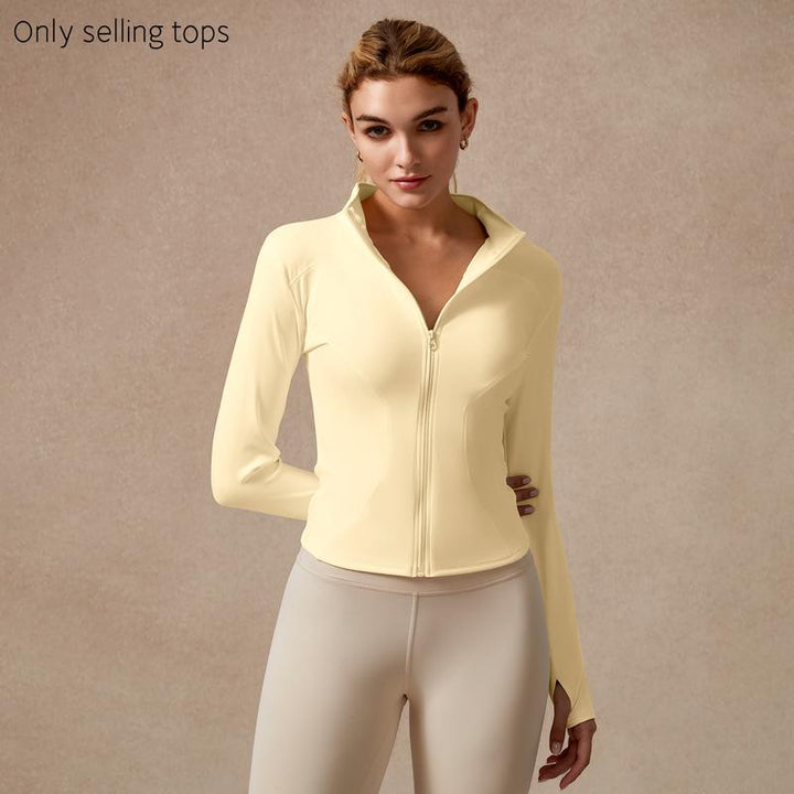 Comfortable women's activewear top, a performance gym shirt with sculpted fit and zip detail.