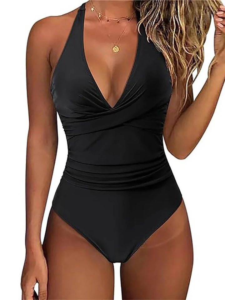 Feel confident in this women's sculpting halter one piece swimsuit with tummy control, perfect for summer.