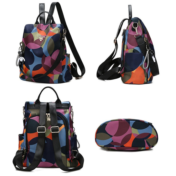 Stylish women's anti-theft daypack, perfect for travel & daily commute, with secure multi-pocket design.