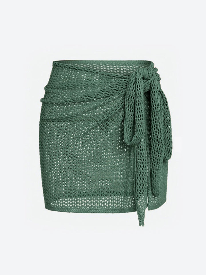Elegant women's sheer knit beach cover-up skirt with high slit, adjustable for perfect summer style.