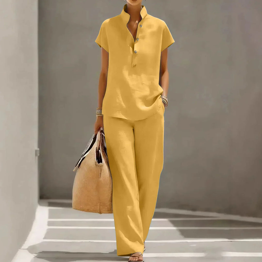 Casual women's short sleeve top and wide leg pants lounge set, a comfortable two-piece for relaxed summer wear.