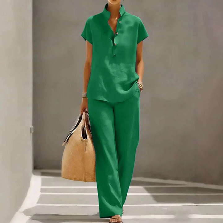 Relaxed fit women's two-piece lounge set featuring a short sleeve top & wide leg pants, ideal for summer comfort.