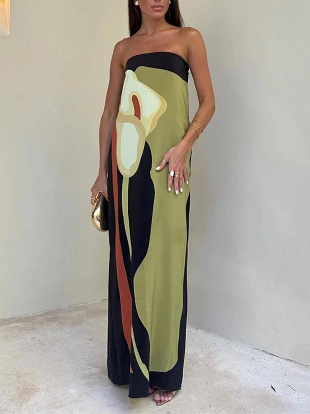 Vibrant green sleeveless maxi sundress for women, offering chic and comfortable summer style. Great vacation dress.