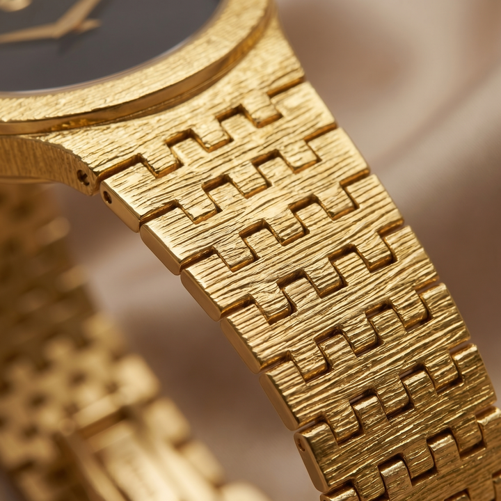 Elegant Women's Slim Seraphine gold minimalist wrist watch. Delicate, sleek design, a perfect fashion accessory.