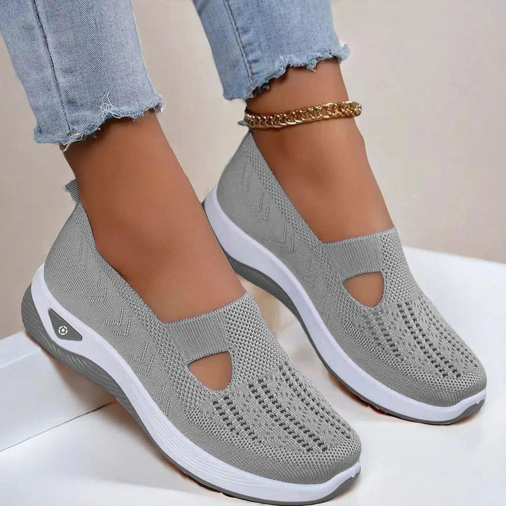 Breathable women's fashion sneakers, ideal for spring & summer casual wear. Supportive slip-ons.