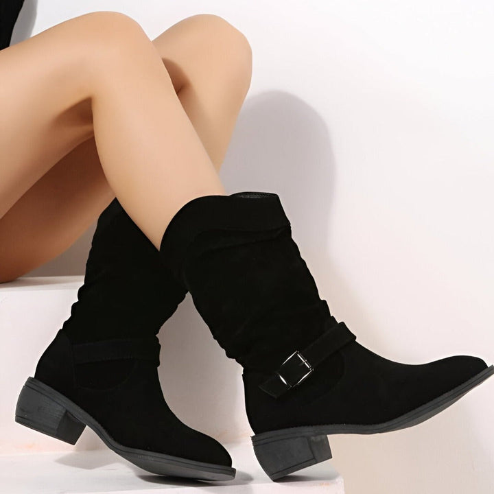 Stylish women's slouchy ankle boots with a comfortable low heel, perfect for everyday wear.