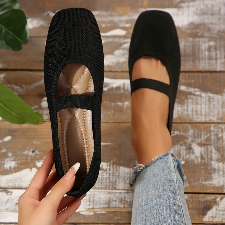 Stylish women's smiling face Mary Jane ballet flats. Comfortable and versatile slip-on shoes for fun, casual everyday outfits.