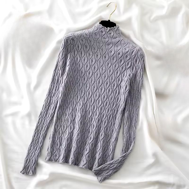 Luxurious women's cashmere blend turtleneck sweater, soft and warm for cold weather style.