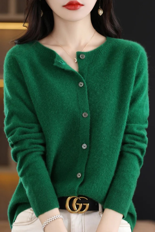 Women's long knit cardigan with a button-front closure, offering a chic and comfortable layering option.
