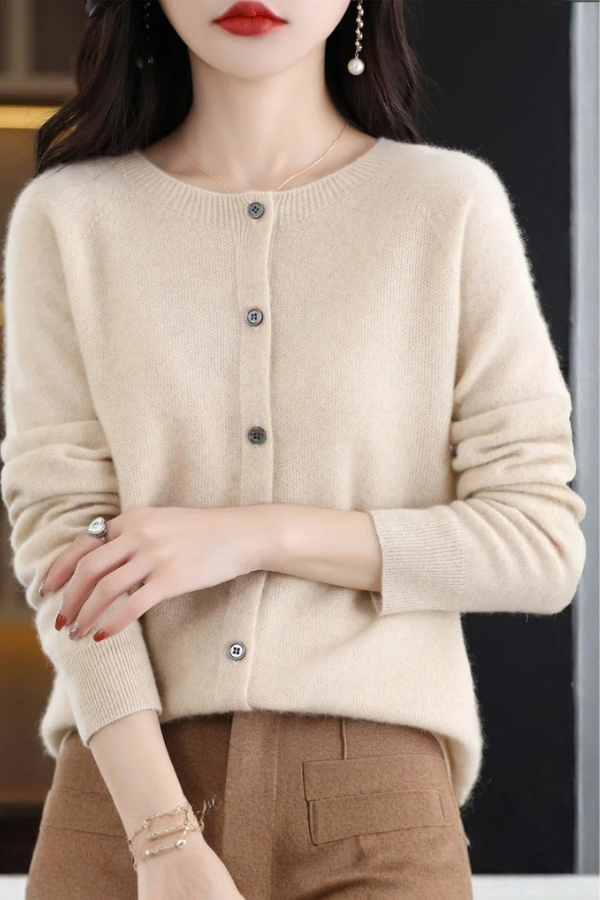 Women's soft long cardigan with button details, an effortless layering piece for versatile fashion.