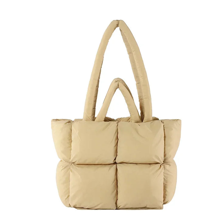 Women's soft padded puffer tote bag, spacious & stylish. A versatile everyday shoulder handbag accessory.