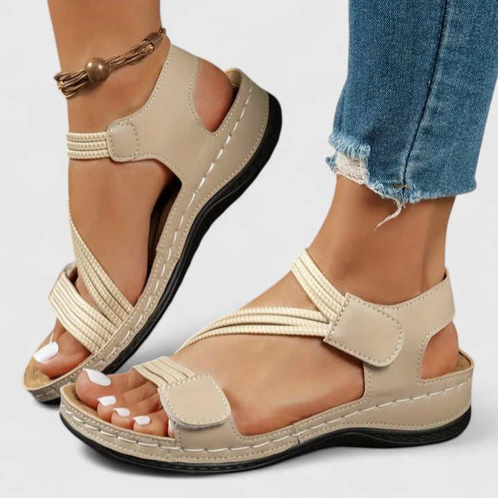 Stylish women's walking sandals, offering orthopedic arch support for prolonged comfort.
