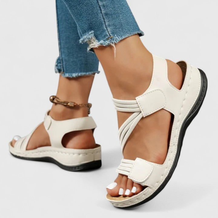 Side view of women's comfortable sandals, highlighting robust arch support for foot health.