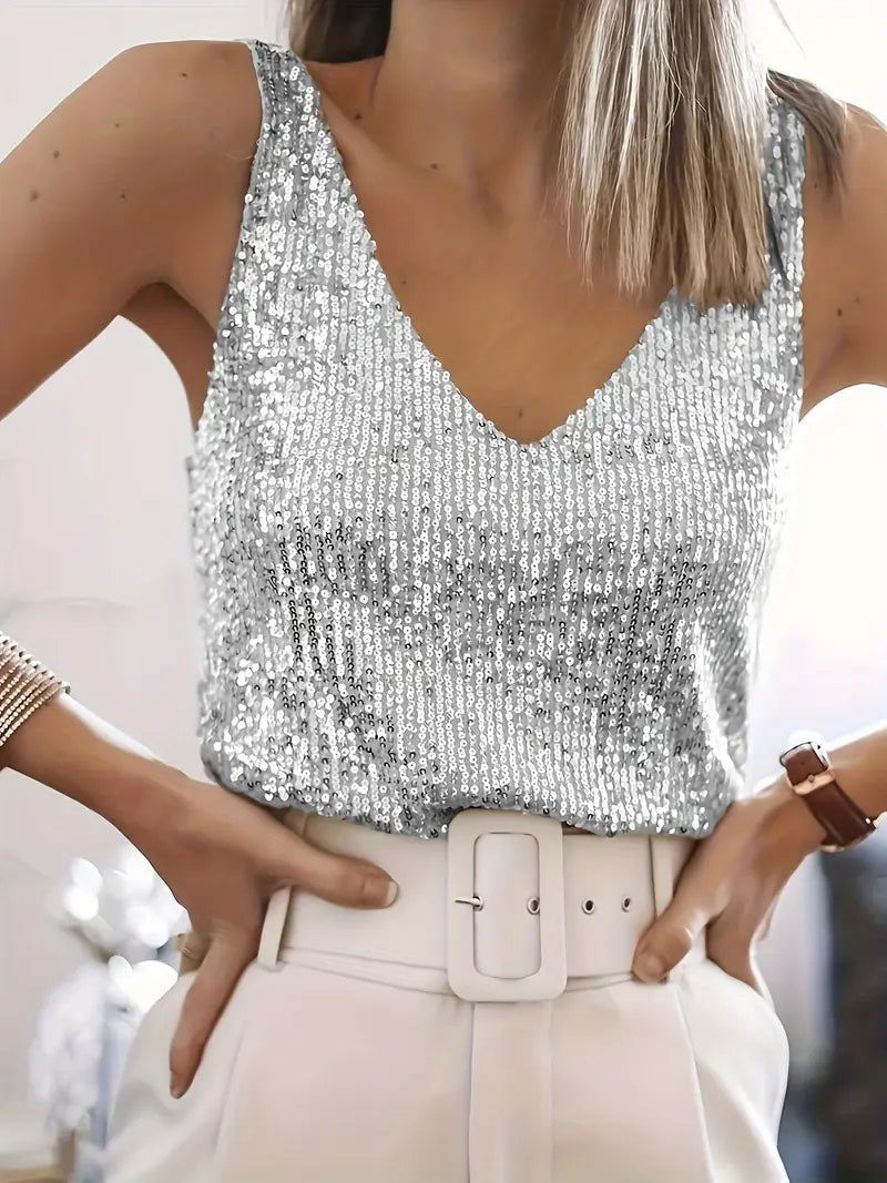 Elegant V-neck long sleeve sparkling top for women, ideal festive and party attire.