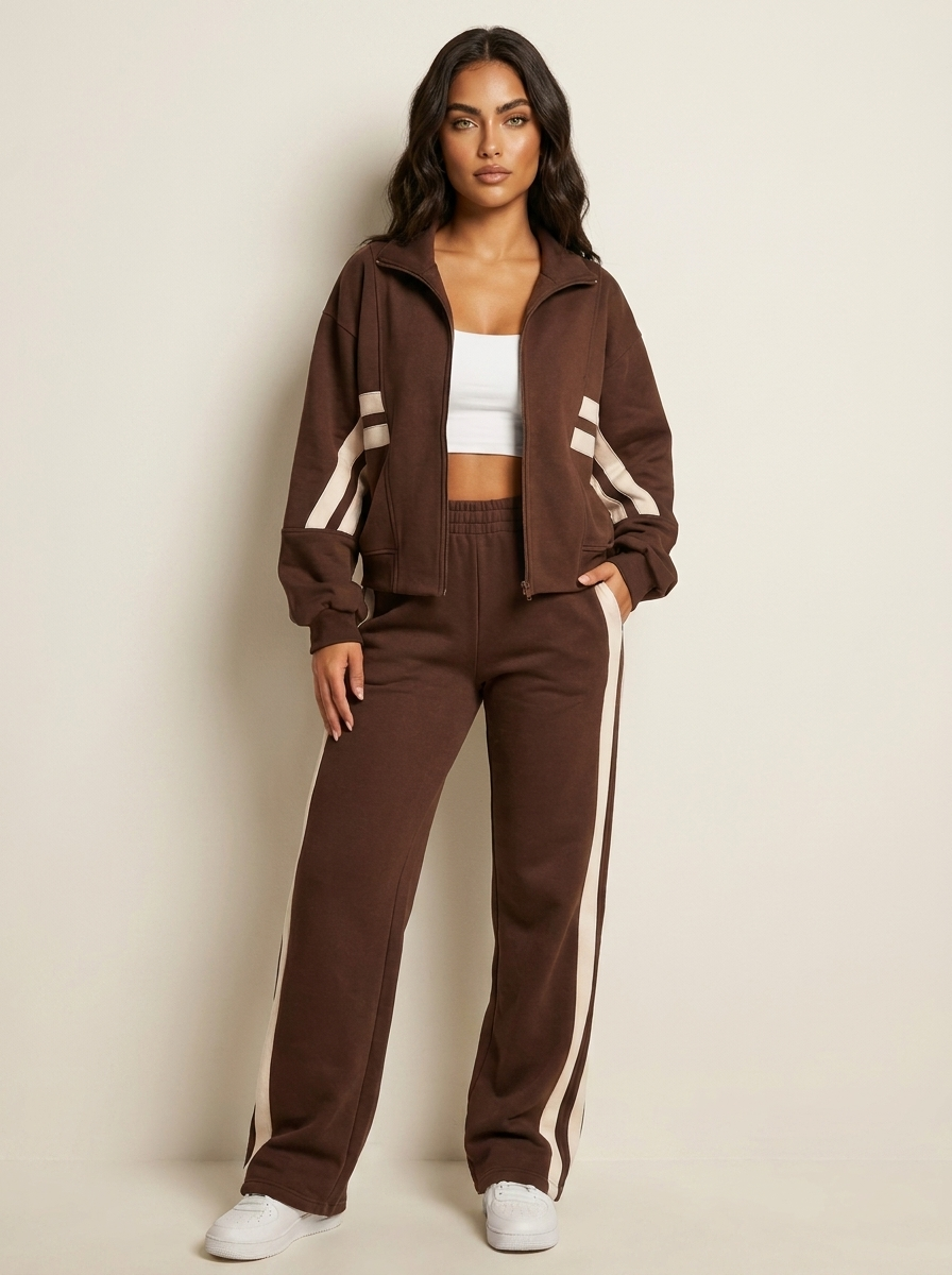 Women's sporty contrast stripe zip-up tracksuit set with wide leg pants for athleisure comfort.