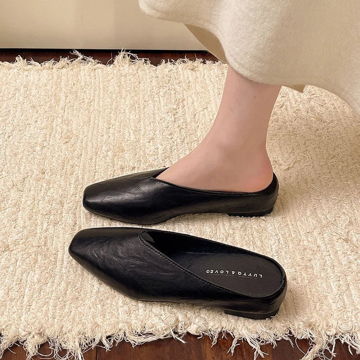 Stylish square toe slip-on flats for women, offering easy wear & modern appeal. Fashionable comfort.