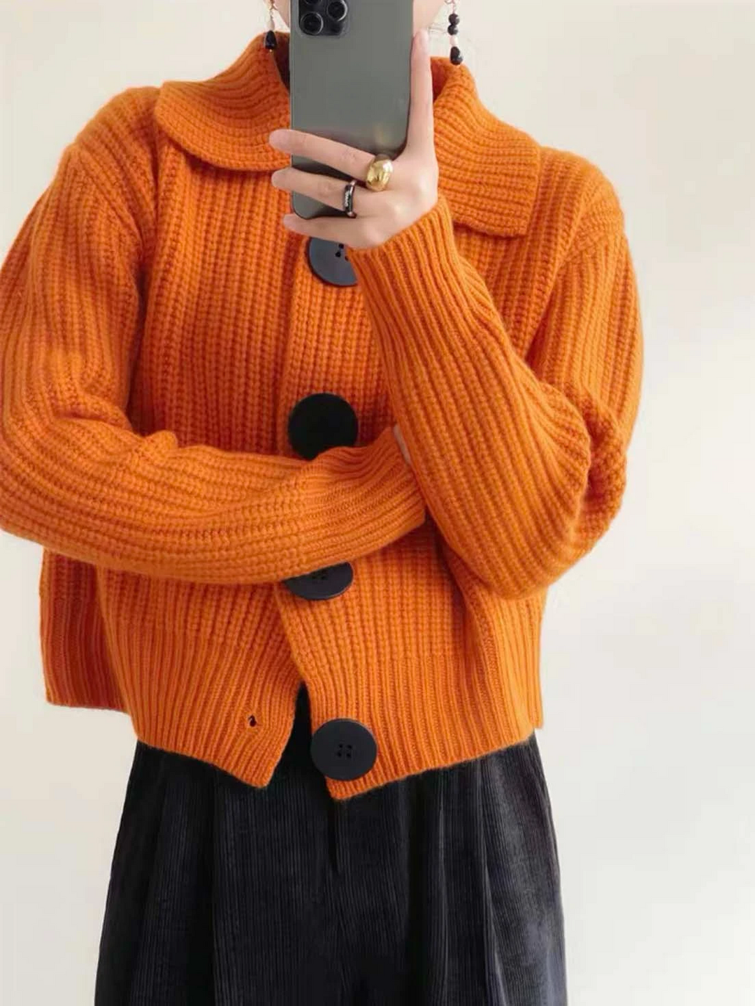 Effortless style women's statement sweater, oversized fit, button-down front, versatile for autumn.