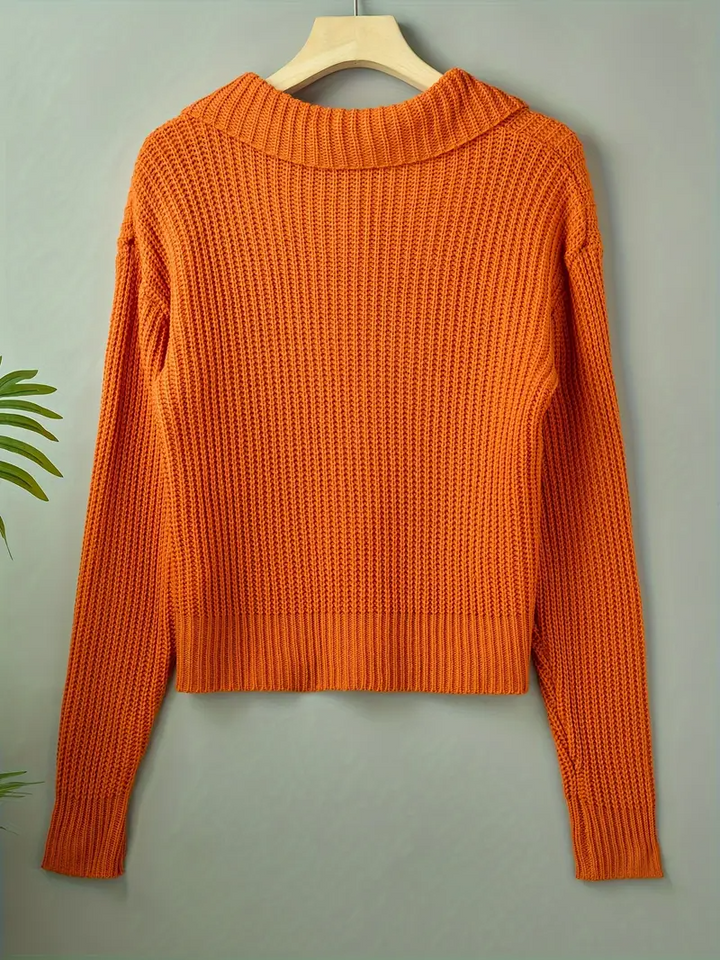 Oversized women's statement cardigan, wide collar, button-down, a stylish autumn wear piece.
