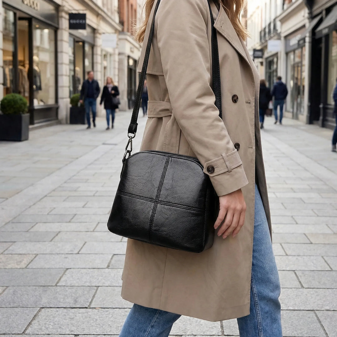 Women's stitched panel crossbody shoulder bag, mini & versatile, perfect for day or evening designer style.