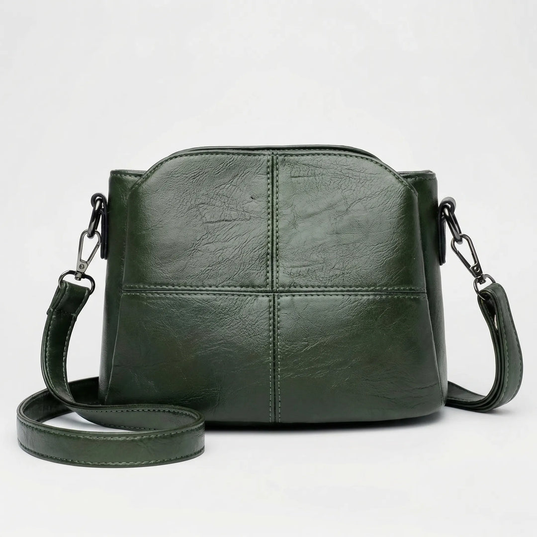 New women's stitched panel crossbody shoulder bag, a versatile mini handbag for all accessories, designer style.