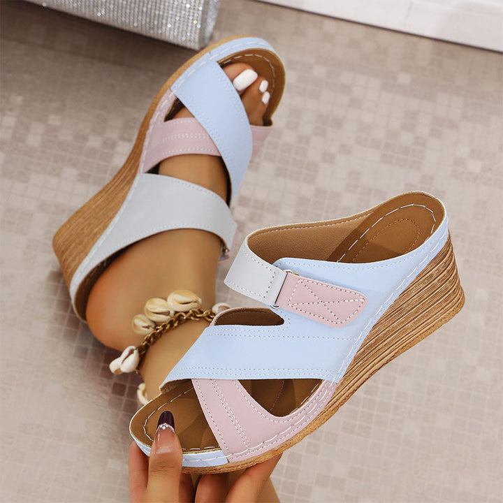 Chic women's strappy wedge sandals, offering comfort and style for casual summer outfits & walking.