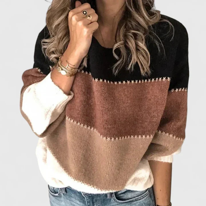 Stylish women's long sleeve striped crew neck pullover sweater, perfect for winter and fall fashion.