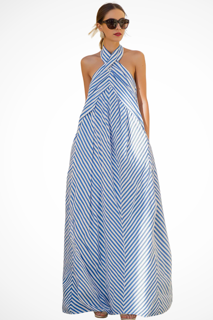 Women's striped halter neck maxi dress, relaxed fit sundress. Ideal for summer casual wear.
