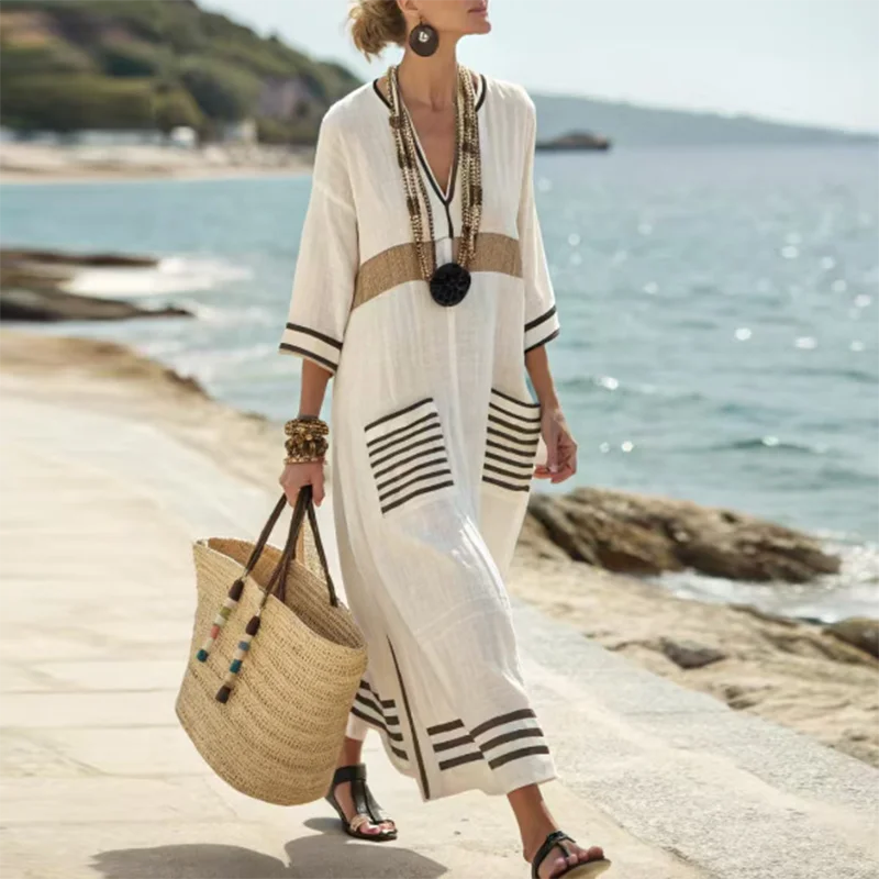 Stylish women's striped V-neck kaftan maxi dress, offering comfort and elegance for summer days.