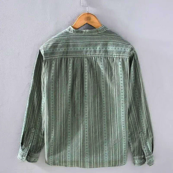 Comfortable women's relaxed fit striped casual shirt with long sleeves, ideal for everyday wear.