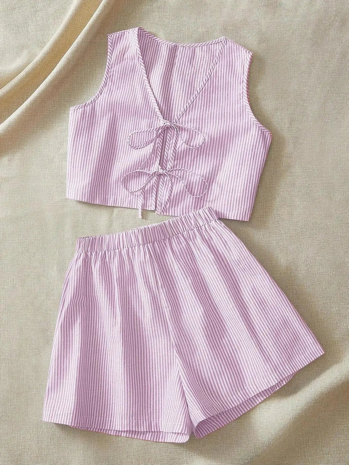 Women's striped lounge set featuring a crop top and matching shorts, made from a comfortable cotton blend.