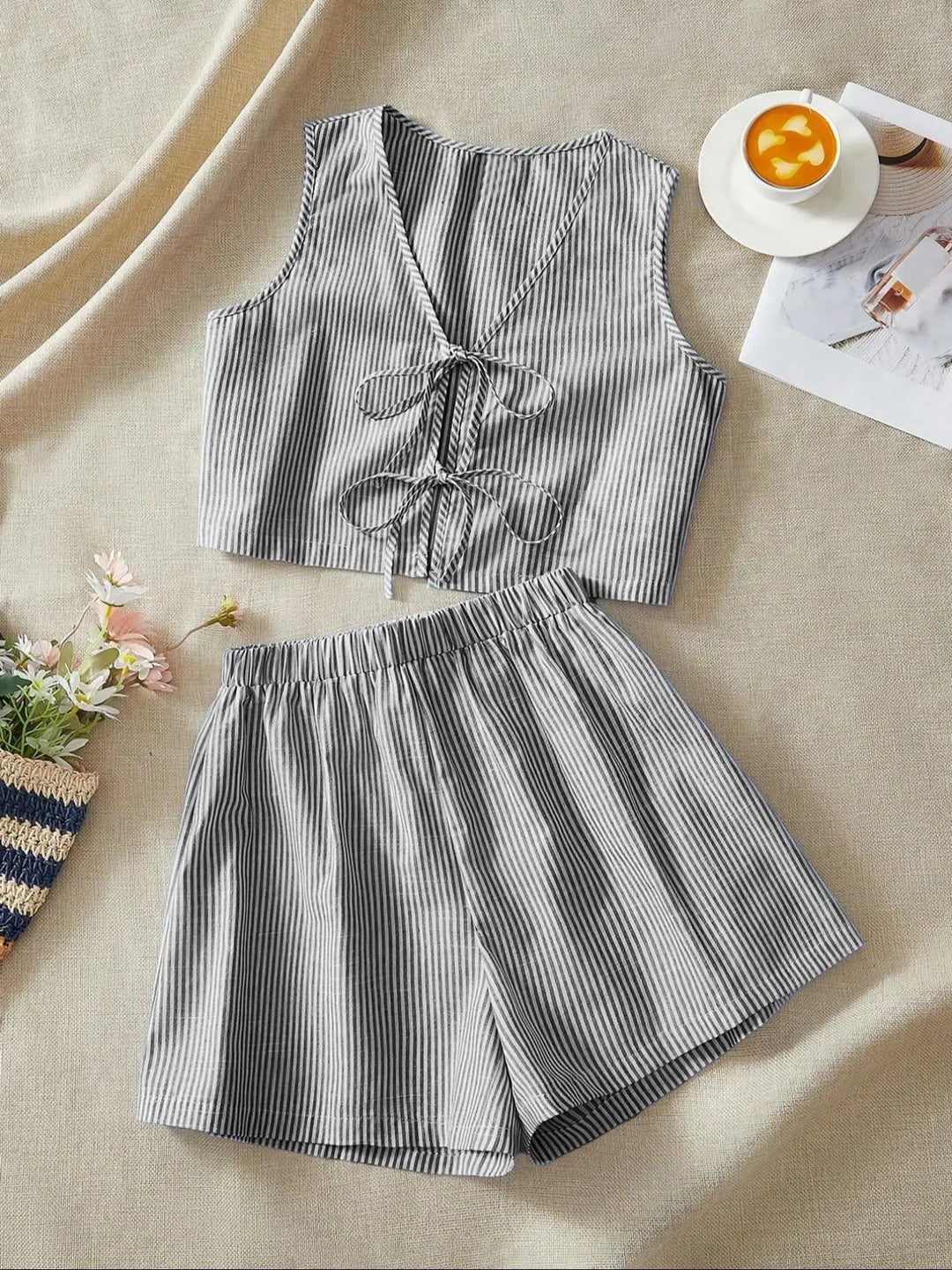 Chic women's striped lounge set, a comfortable cotton blend crop top and shorts combo, great for summer relaxation.