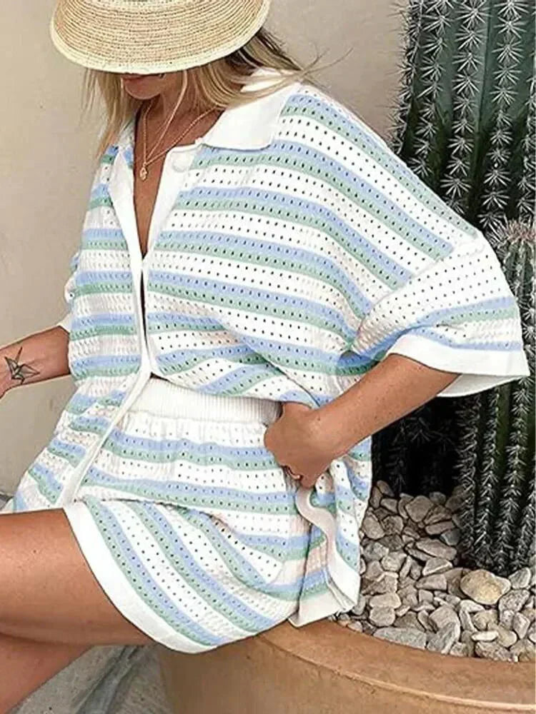 Comfy women's striped short set with elastic waist shorts & button-up top. Relaxed summer wear.