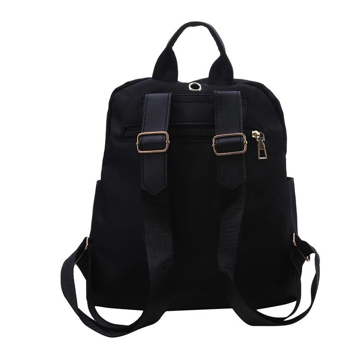 Durable PU leather women's travel backpack, ideal for trips, work, and daily essentials.
