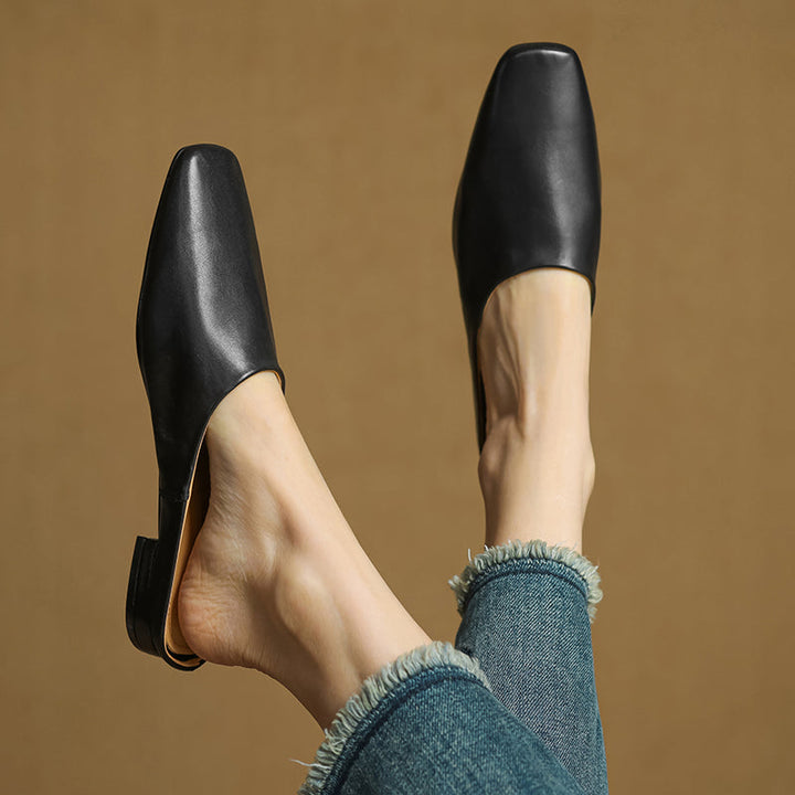 Fashionable women's square-toe mules featuring a sturdy block heel and easy slip-on design.