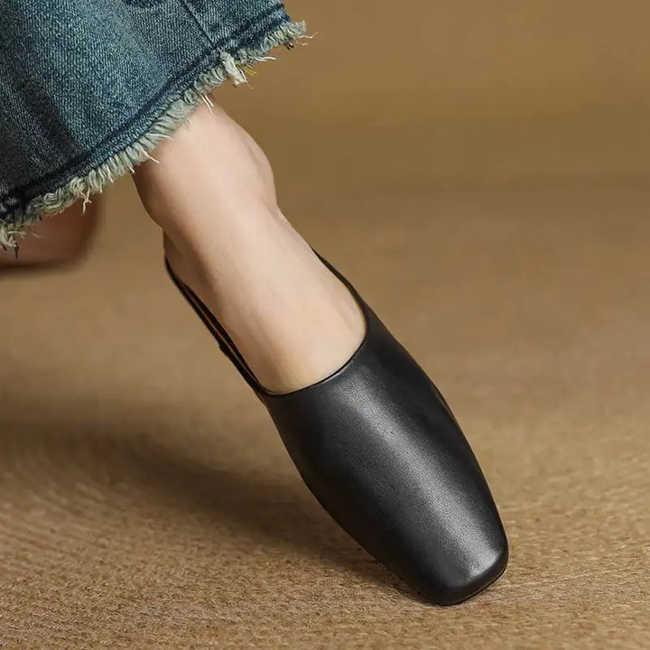 Modern slip-on mules for women with a unique square toe and stable block heel.
