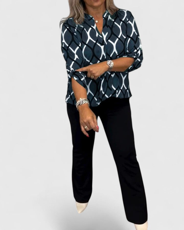 Versatile women's fashion top with a unique graphic print, lightweight and comfortable for everyday style.