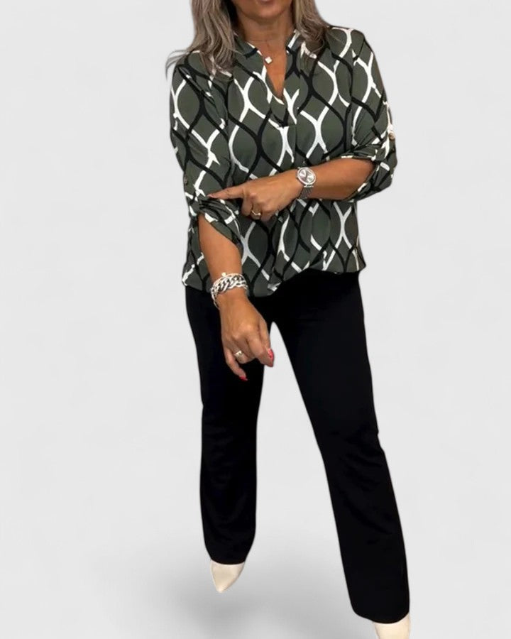 Lightweight women's graphic print blouse, a loose-fit comfort top ideal for casual wear and fashion.