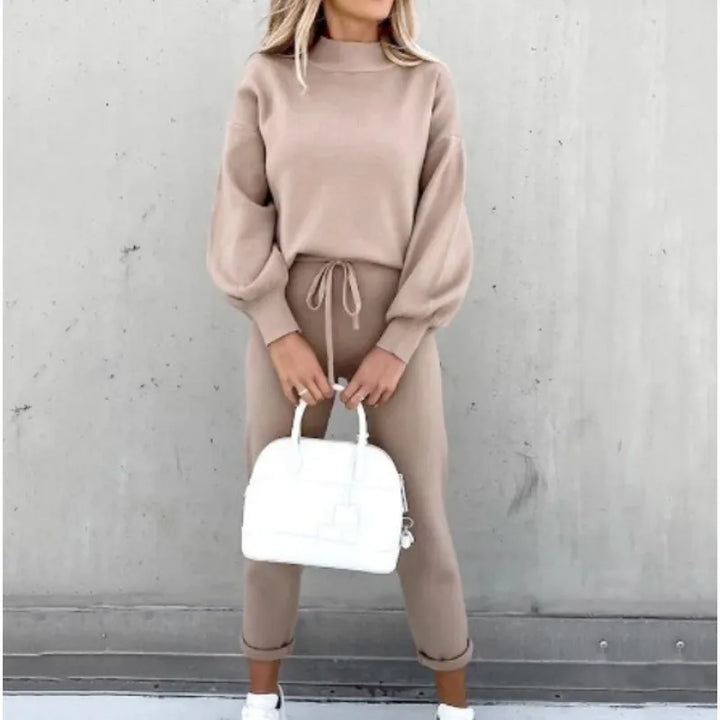 Chic women's matching two-piece set: mock neck top & drawstring lounge pants for a coordinated look.