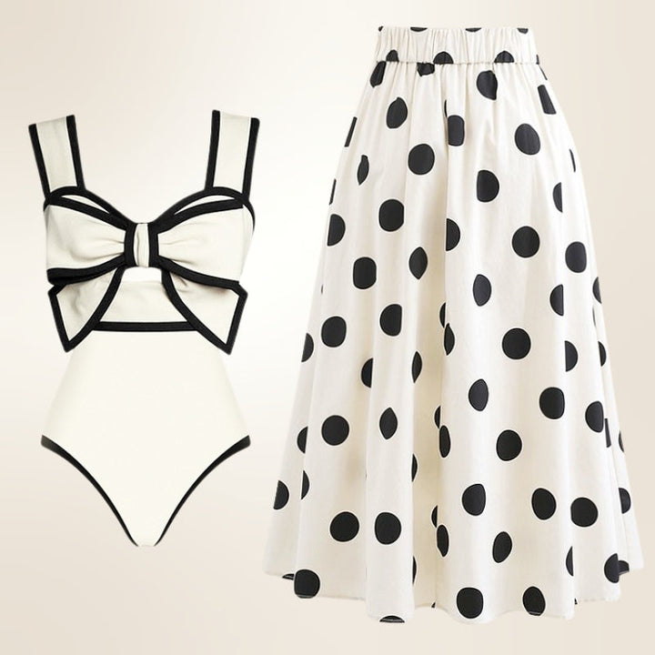 Women's stylish one-piece swimsuit with attached skirt, perfect for beachwear & resort vacation.